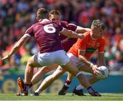 26 June 2022; Aidan Nugent of Armagh in action against John Daly, 6, and Jack Glynn of Galway during the GAA Football All-Ireland Senior Championship Quarter-Final match between Armagh and Galway at Croke Park, Dublin. Photo by Ray McManus/Sportsfile
