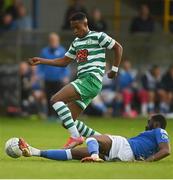 1 July 2022; Aidomo Emakhu of Shamrock Rovers is tackled by Elie-Gael N'Zeyi of Finn Harps during the SSE Airtricity League Premier Division match between Finn Harps and Shamrock Rovers at Finn Park in Ballybofey, Donegal. Photo by Ramsey Cardy/Sportsfile