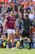 26 June 2022; Damien Comer of Galway is shown a yellow card by referee David Coldrick during the GAA Football All-Ireland Senior Championship Quarter-Final match between Armagh and Galway at Croke Park, Dublin. Photo by Ray McManus/Sportsfile