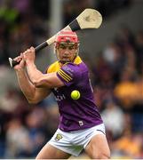 18 June 2022; Lee Chin of Wexford takes a free during the GAA Hurling All-Ireland Senior Championship Quarter-Final match between Clare and Wexford at the FBD Semple Stadium in Thurles, Tipperary. Photo by Ray McManus/Sportsfile