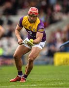 18 June 2022; Lee Chin of Wexford takes a free during the GAA Hurling All-Ireland Senior Championship Quarter-Final match between Clare and Wexford at the FBD Semple Stadium in Thurles, Tipperary. Photo by Ray McManus/Sportsfile