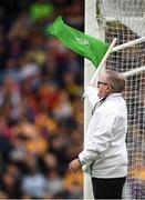 18 June 2022; An umpire waves a green flag, to indicate a goal had been scored, during the GAA Hurling All-Ireland Senior Championship Quarter-Final match between Clare and Wexford at the FBD Semple Stadium in Thurles, Tipperary. Photo by Ray McManus/Sportsfile
