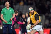2 July 2022; Former Ireland international Michael Bent, watched by Ireland forwards coach Paul O'Connell, warms up before the Steinlager Series match between the New Zealand and Ireland at Eden Park in Auckland, New Zealand. Photo by Brendan Moran/Sportsfile