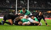2 July 2022; Keith Earls of Ireland scores his side's first try despite the tackle of Jordie Barrett of New Zealand during the Steinlager Series match between the New Zealand and Ireland at Eden Park in Auckland, New Zealand. Photo by Brendan Moran/Sportsfile