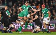 2 July 2022; Caelan Doris of Ireland is tackled by Brodie Retallick of New Zealand during the Steinlager Series match between the New Zealand and Ireland at Eden Park in Auckland, New Zealand. Photo by Brendan Moran/Sportsfile