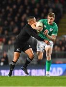 2 July 2022; Garry Ringrose of Ireland is tackled by Aaron Smith of New Zealand during the Steinlager Series match between the New Zealand and Ireland at Eden Park in Auckland, New Zealand. Photo by Brendan Moran/Sportsfile