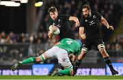 2 July 2022; Beauden Barrett of New Zealand is tackled by Tadhg Beirne of Ireland during the Steinlager Series match between the New Zealand and Ireland at Eden Park in Auckland, New Zealand. Photo by Brendan Moran/Sportsfile