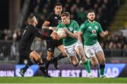 2 July 2022; Garry Ringrose of Ireland is tackled by Aaron Smith of New Zealand during the Steinlager Series match between the New Zealand and Ireland at Eden Park in Auckland, New Zealand. Photo by Brendan Moran/Sportsfile