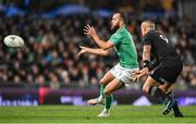 2 July 2022; Jamison Gibson Park of Ireland offloads under pressure from Aaron Smith of New Zealand during the Steinlager Series match between the New Zealand and Ireland at Eden Park in Auckland, New Zealand. Photo by Brendan Moran/Sportsfile