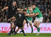 2 July 2022; Robbie Henshaw of Ireland is tackled by Aaron Smith of New Zealand during the Steinlager Series match between the New Zealand and Ireland at Eden Park in Auckland, New Zealand. Photo by Brendan Moran/Sportsfile