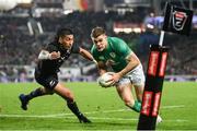 2 July 2022; Garry Ringrose of Ireland on his way to scoring his side's second try during the Steinlager Series match between the New Zealand and Ireland at Eden Park in Auckland, New Zealand. Photo by Brendan Moran/Sportsfile