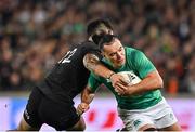 2 July 2022; James Lowe of Ireland is tackled by Quinn Tupaea of New Zealand during the Steinlager Series match between the New Zealand and Ireland at Eden Park in Auckland, New Zealand. Photo by Brendan Moran/Sportsfile