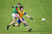 2 July 2022; Fionn Walsh of Rathgormack scores a goal despite the efforts of George Ayers of San Francisco during the match between Rathgormack, Waterford, and San Francisco at the John West Féile Peile na nÓg National Gaelic and Ladies football finals 2022 at the GAA National Games Development Centre Campus in Abbotstown, Dublin. Eighty-eight club sides from Ireland, the UK, Europe and US competed in the final stages of the under-15 competition across nine venues, one of the biggest underage sporting events on the continent, sponsored for the seventh time by John West. Photo by Ramsey Cardy/Sportsfile