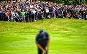 2 July 2022; Spectators watch as Shane Lowry of Ireland putts on the 18th green during day three of the Horizon Irish Open Golf Championship at Mount Juliet Golf Club in Thomastown, Kilkenny. Photo by Eóin Noonan/Sportsfile