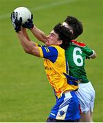 2 July 2022; Joseph McDonagh of San Francisco in action against Thomas Skehan of Rathgormack during the match between Rathgormack, Waterford, and San Francisco at the John West Féile Peile na nÓg National Gaelic and Ladies football finals 2022 at the GAA National Games Development Centre Campus in Abbotstown, Dublin. Eighty-eight club sides from Ireland, the UK, Europe and US competed in the final stages of the under-15 competition across nine venues, one of the biggest underage sporting events on the continent, sponsored for the seventh time by John West. Photo by Ramsey Cardy/Sportsfile