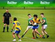 2 July 2022; Joseph McDonagh of San Francisco in action against Thomas Óg Dee of Rathgormack during the match between Rathgormack, Waterford, and San Francisco at the John West Féile Peile na nÓg National Gaelic and Ladies football finals 2022 at the GAA National Games Development Centre Campus in Abbotstown, Dublin. Eighty-eight club sides from Ireland, the UK, Europe and US competed in the final stages of the under-15 competition across nine venues, one of the biggest underage sporting events on the continent, sponsored for the seventh time by John West. Photo by Ramsey Cardy/Sportsfile