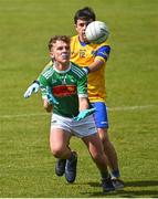 2 July 2022; Thomas Lynch of Rathgormack in action against Gavin Madole of San Francisco during the match between Rathgormack, Waterford, and San Francisco at the John West Féile Peile na nÓg National Gaelic and Ladies football finals 2022 at the GAA National Games Development Centre Campus in Abbotstown, Dublin. Eighty-eight club sides from Ireland, the UK, Europe and US competed in the final stages of the under-15 competition across nine venues, one of the biggest underage sporting events on the continent, sponsored for the seventh time by John West. Photo by Ramsey Cardy/Sportsfile