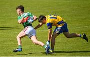 2 July 2022; Thomas Lynch of Rathgormack in action against Gavin Madole of San Francisco during the match between Rathgormack, Waterford, and San Francisco at the John West Féile Peile na nÓg National Gaelic and Ladies football finals 2022 at the GAA National Games Development Centre Campus in Abbotstown, Dublin. Eighty-eight club sides from Ireland, the UK, Europe and US competed in the final stages of the under-15 competition across nine venues, one of the biggest underage sporting events on the continent, sponsored for the seventh time by John West. Photo by Ramsey Cardy/Sportsfile