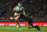 2 July 2022; Hugo Keenan of Ireland is tackled by Leicester Fainga'anuku of New Zealand during the Steinlager Series match between the New Zealand and Ireland at Eden Park in Auckland, New Zealand. Photo by Brendan Moran/Sportsfile
