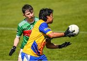 2 July 2022; Christian Calero of San Francisco in action against Conor Power of Rathgormack during the match between Rathgormack, Waterford, and San Francisco at the John West Féile Peile na nÓg National Gaelic and Ladies football finals 2022 at the GAA National Games Development Centre Campus in Abbotstown, Dublin. Eighty-eight club sides from Ireland, the UK, Europe and US competed in the final stages of the under-15 competition across nine venues, one of the biggest underage sporting events on the continent, sponsored for the seventh time by John West. Photo by Ramsey Cardy/Sportsfile