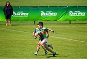 2 July 2022; Conor Power of Rathgormack in action against Christian Calero of San Francisco during the match between Rathgormack, Waterford, and San Francisco at the John West Féile Peile na nÓg National Gaelic and Ladies football finals 2022 at the GAA National Games Development Centre Campus in Abbotstown, Dublin. Eighty-eight club sides from Ireland, the UK, Europe and US competed in the final stages of the under-15 competition across nine venues, one of the biggest underage sporting events on the continent, sponsored for the seventh time by John West. Photo by Ramsey Cardy/Sportsfile