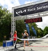2 July 2022; Ann-Marie McGlynn of Letterkenny AC crosses the line as first woman home and breaks the course record during the Kia Race Series Roscommon 10 Mile race in Roscommon Town. Photo by David Fitzgerald/Sportsfile