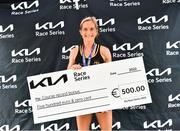 2 July 2022; Ann-Marie McGlynn of Letterkenny AC with her cheque after breaking the course record during the Kia Race Series Roscommon 10 Mile race in Roscommon Town. Photo by David Fitzgerald/Sportsfile