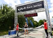 2 July 2022; Ann-Marie McGlynn of Letterkenny AC crosses the line as first woman home and breaks the course record during the Kia Race Series Roscommon 10 Mile race in Roscommon Town. Photo by David Fitzgerald/Sportsfile