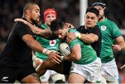 2 July 2022; Hugo Keenan of Ireland is tackled by Quinn Tupaea of New Zealand during the Steinlager Series match between the New Zealand and Ireland at Eden Park in Auckland, New Zealand. Photo by Brendan Moran/Sportsfile