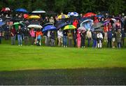 2 July 2022; Spectators during a rain shower on day three of the Horizon Irish Open Golf Championship at Mount Juliet Golf Club in Thomastown, Kilkenny. Photo by Eóin Noonan/Sportsfile