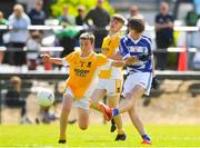 2 July 2022; Patrick Small of Blessington, Co Wicklow, in action against Jack Brady of Clontibert, Co Monaghan, during the Shield Semi-Final between Blessington, Co Wicklow, and Clontibert, Co Monaghan, at the John West National Football Feile 2022 event at Kildare GAA Centre in Hawkfield, Kildare. Photo by Matt Browne/Sportsfile
