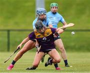 2 July 2022; Mag Byrne of Wexford in action against Muireann Kelleher of Dublin during round 5 of the Glen Dimplex All-Ireland Senior Camogie Championship match between Wexford and Dublin at Bellefield GAA Complex in Enniscorthy, Wexford. Photo by Michael P Ryan/Sportsfile