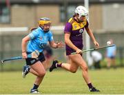 2 July 2022; Amy Cardiff of Wexford in action against Elyse-Jamieson Murphy of Dublin during round 5 of the Glen Dimplex All-Ireland Senior Camogie Championship match between Wexford and Dublin at Bellefield GAA Complex in Enniscorthy, Wexford. Photo by Michael P Ryan/Sportsfile