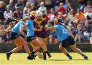 2 July 2022; Amy Cardiff of Wexford in action against Elyse-Jamieson Murphy of Dublin during round 5 of the Glen Dimplex All-Ireland Senior Camogie Championship at Bellefield GAA Complex in Enniscorthy, Wexford. Photo by Michael P Ryan/Sportsfile