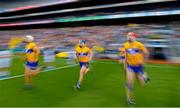 2 July 2022; Rory Hayes of Clare, centre, runs out before the GAA Hurling All-Ireland Senior Championship Semi-Final match between Kilkenny and Clare at Croke Park in Dublin. Photo by Ramsey Cardy/Sportsfile
