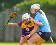 2 July 2022; Linda Bolger of Wexford in action against Aisling Maher of Dublin during round 5 of the Glen Dimplex All-Ireland Senior Camogie Championship at Bellefield GAA Complex in Enniscorthy, Wexford. Photo by Michael P Ryan/Sportsfile