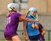 2 July 2022; Eve O'Brien of Dublin is tackled by Ciara O'Connor of Wexford during round 5 of the Glen Dimplex All-Ireland Senior Camogie Championship at Bellefield GAA Complex in Enniscorthy, Wexford. Photo by Michael P Ryan/Sportsfile