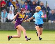 2 July 2022; Michelle Martin of Wexford in action against Gaby Couch of Dublin during round 5 of the Glen Dimplex All-Ireland Senior Camogie Championship at Bellefield GAA Complex in Enniscorthy, Wexford. Photo by Michael P Ryan/Sportsfile