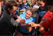 2 July 2022; Aisling Maher of Dublin signs autographs for young supporters after round 5 of the Glen Dimplex All-Ireland Senior Camogie Championship at Bellefield GAA Complex in Enniscorthy, Wexford. Photo by Michael P Ryan/Sportsfile
