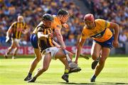 2 July 2022; Mikey Butler of Kilkenny in action against Clare players Tony Kelly, centre, and Peter Duggan of Clare during the GAA Hurling All-Ireland Senior Championship Semi-Final match between Kilkenny and Clare at Croke Park in Dublin. Photo by John Sheridan/Sportsfile