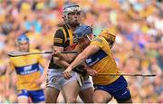 2 July 2022; Cian Nolan of Clare is tackled by TJ Reid, left, and Billy Ryan of Kilkenny during the GAA Hurling All-Ireland Senior Championship Semi-Final match between Kilkenny and Clare at Croke Park in Dublin. Photo by Ramsey Cardy/Sportsfile
