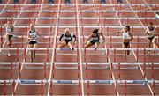 2 July 2022; Jade Barber of USA, second from right, on her way to winning the Women's 100m Hurdles ahead of second place Sarah Lavin of Emerald AC, second from left, during the 2022 Morton Games at Morton Stadium in Santry, Dublin. Photo by David Fitzgerald/Sportsfile