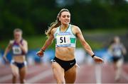 2 July 2022; Sophie Becker of Raheny Shamrock AC crosses the line to win the Women's 400m during the 2022 Morton Games at Morton Stadium in Santry, Dublin. Photo by David Fitzgerald/Sportsfile