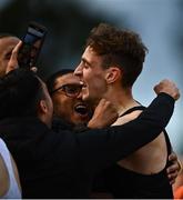 2 July 2022; Cathal Doyle of Clonliffe Harriers AC is congratulated by friends after they thought he won the Morton Mile after a photo finish alongside Andrew Coscoran during the 2022 Morton Games at Morton Stadium in Santry, Dublin. Photo by David Fitzgerald/Sportsfile