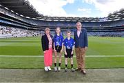 2 July 2022; Uachtarán Chumann Lúthchleas Gael Larry McCarthy, Chairperson of Cumann na mBunscol Mairead O'Callaghan, with referees Joseph Breslin, Seir Kieran's NS, Clareen, Birr Offaly, and Ruby Oakley, Killeen NS, Killeen, Birr, Offaly, ahead of the INTO Cumann na mBunscol GAA Respect Exhibition Go Games at half-time of the GAA Hurling All-Ireland Senior Championship Semi-Final match between Kilkenny and Clare at Croke Park in Dublin. Photo by Daire Brennan/Sportsfile