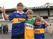 3 July 2022; Sisters from left 10 year old Kate, 9 year old Lucy and 5 year old Sarah Cunningham from Roscrea Co Tipperary before the Electric Ireland GAA Hurling All-Ireland Minor Championship Final match between Tipperary and Offaly at UPMC Nowlan Park, Kilkenny.Photo by Matt Browne/Sportsfile