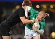 2 July 2022; Keith Earls of Ireland is tackled by Jordie Barrett of New Zealand during the Steinlager Series match between the New Zealand and Ireland at Eden Park in Auckland, New Zealand. Photo by Brendan Moran/Sportsfile