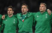 2 July 2022; Ireland players, from left, Joey Carbery, Jack Conan and Kieran Treadwell during the national anthems before the Steinlager Series match between the New Zealand and Ireland at Eden Park in Auckland, New Zealand. Photo by Brendan Moran/Sportsfile