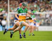 3 July 2022; Ter Guinan of Offaly in action against Jack O'Callaghan of Tipperary during the Electric Ireland GAA Hurling All-Ireland Minor Championship Final match between Tipperary and Offaly at UPMC Nowlan Park, Kilkenny. Photo by Matt Browne/Sportsfile