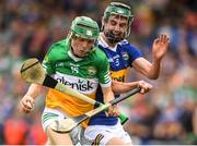 3 July 2022; Adam Screeney of Offaly in action against Sam O'Farrell of Tipperary during the Electric Ireland GAA Hurling All-Ireland Minor Championship Final match between Tipperary and Offaly at UPMC Nowlan Park, Kilkenny. Photo by Matt Browne/Sportsfile